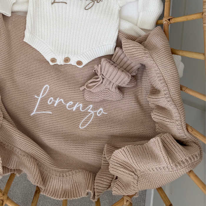 Beige knit personalised blanket with frill trim, bow detail and 'Lorenzo' script