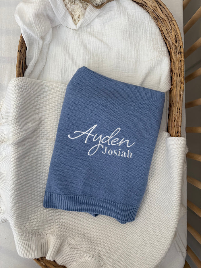 Personalised knitted blanket in blue, embroidered Ayden Josiah