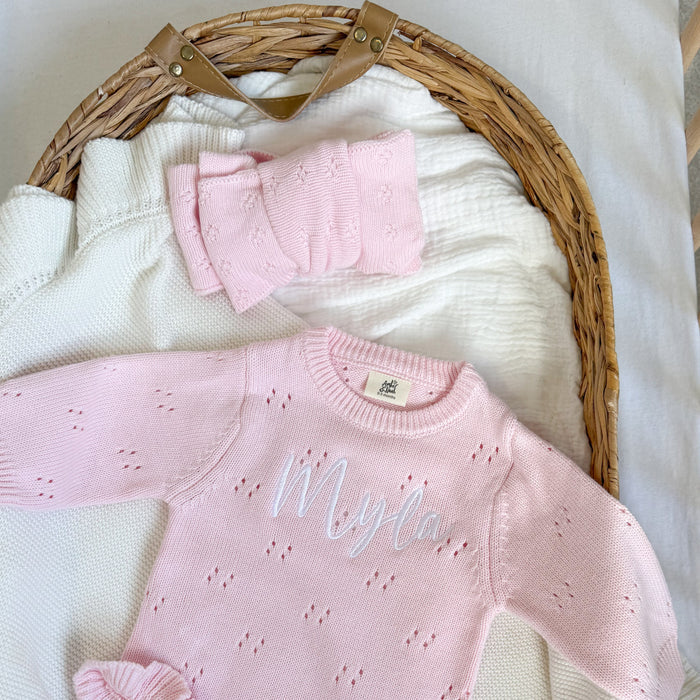 Pink pointelle bow headband with textured layered bow