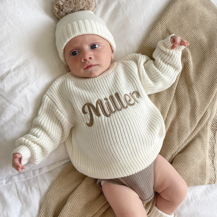 Baby chunky knitted jumper with off-white knit and brown 'Miller' script center