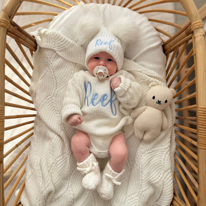 Baby white knitted jumper and hat set with script 'Reef' and bunny plush toy