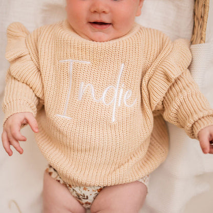 Beige knit jumper with frill sleeves and 'Katie' embroidery on the front