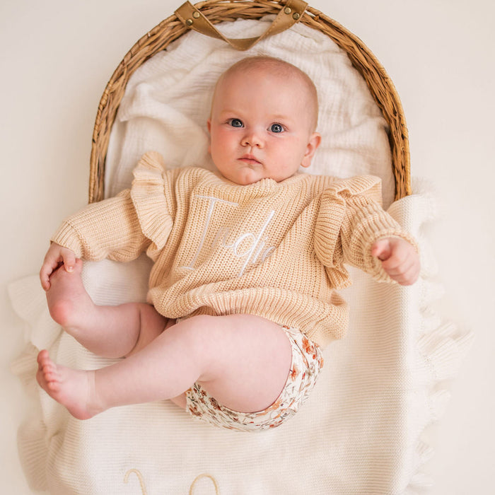 Beige knitted jumper with frill cuffs and 'Katie' embroidery at chest