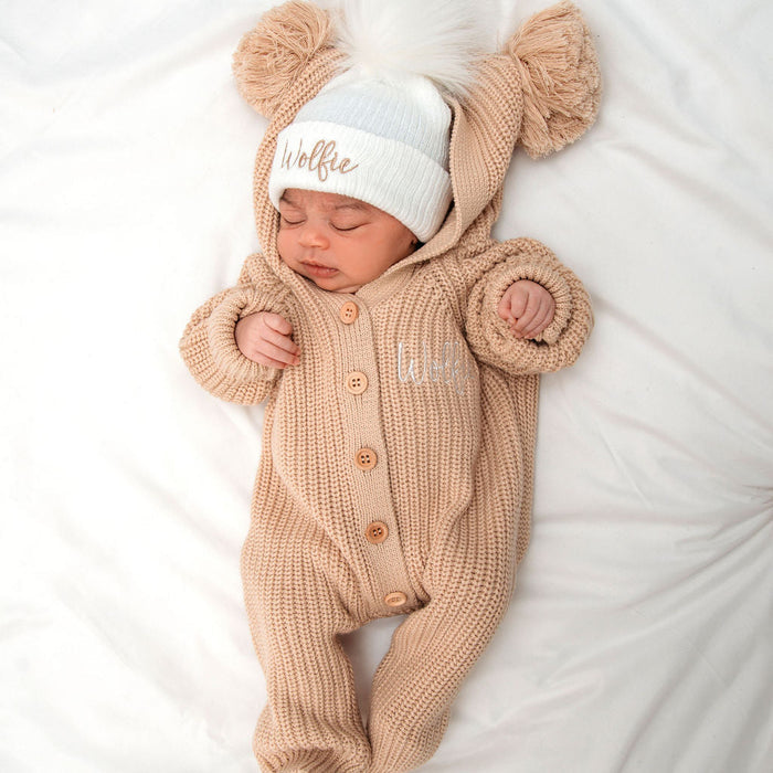 Beige knit romper with hood and pom beanie hat, beanie 'Wolffie' in light blue knit