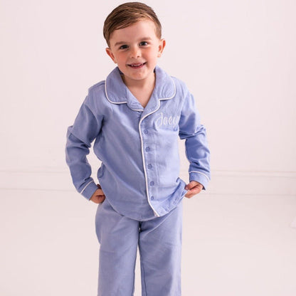 Light blue toddler pajama set: button-front shirt and embroidered script