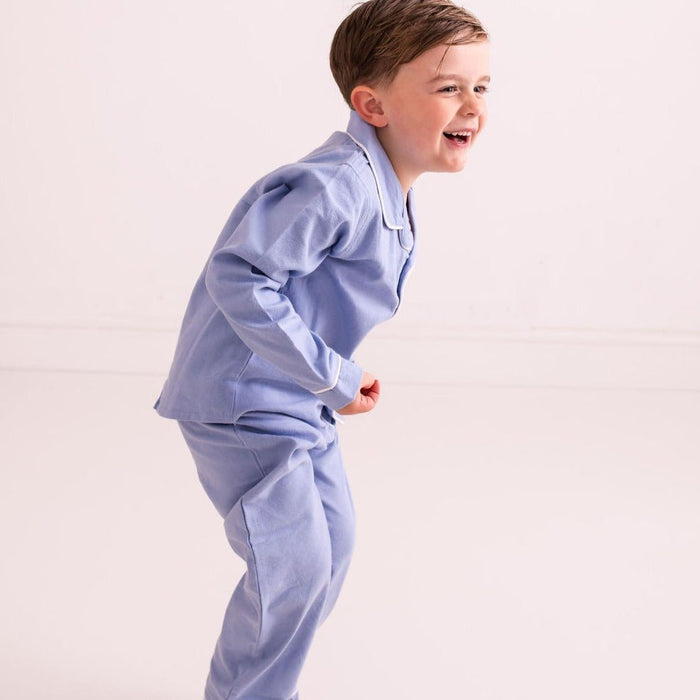 Light blue toddler pajama set side view with button-front shirt and matching pants