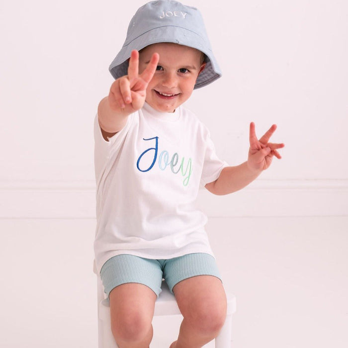 White T-shirt with multicolor script 'Joey' embroidery on the front