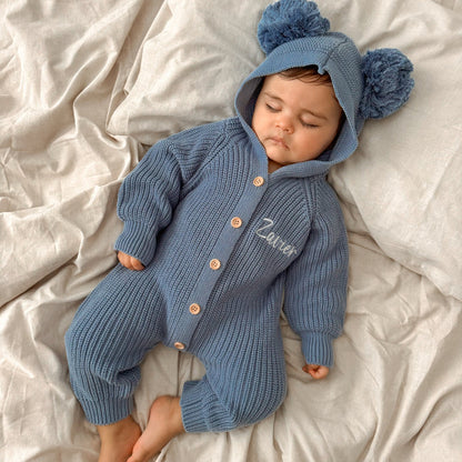 Blue knit hooded romper with pom-poms and button front, 'Ziver' embroidery