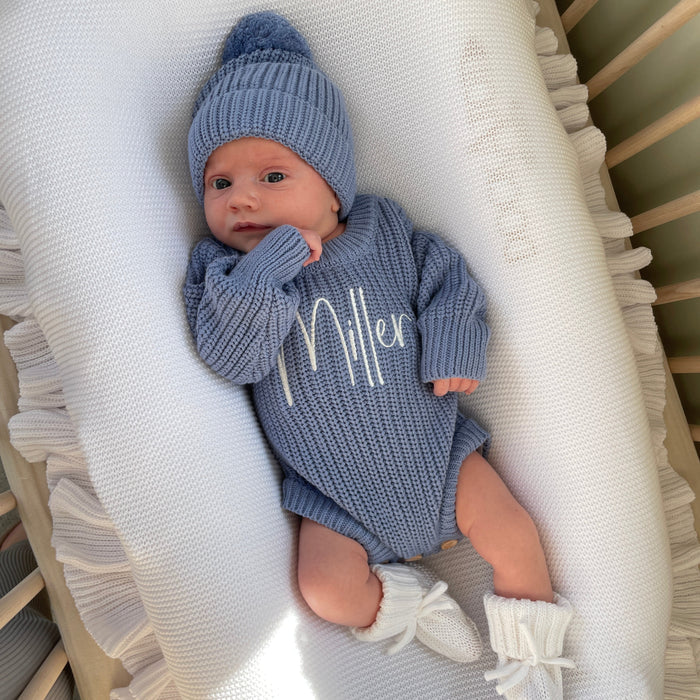 Blue knitted romper with white embroidered “Allen”, ribbed beanie and matching mitts