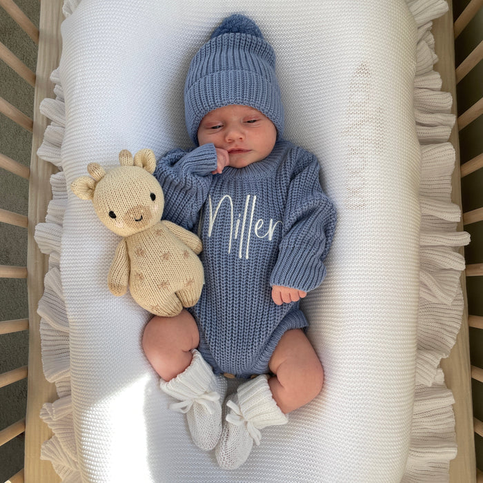 Blue knitted romper with white embroidered “Allen”, ribbed knit beanie and teddy plush