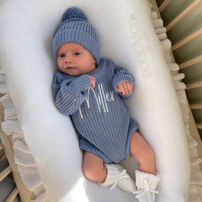Blue knitted romper with white embroidered “Allen”, ribbed knit beanie and booties