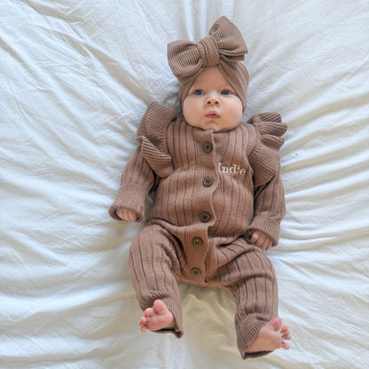 Brown ribbed baby romper with frill sleeves, bow headwrap, front buttons, 'Indie' print