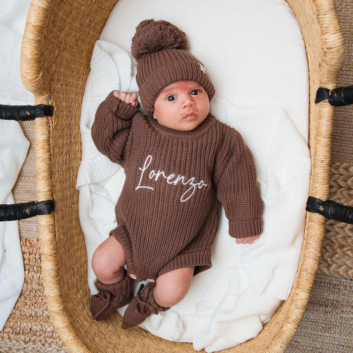 Personalised knitted romper and beanie set in dark brown, with 'lorenzo' print