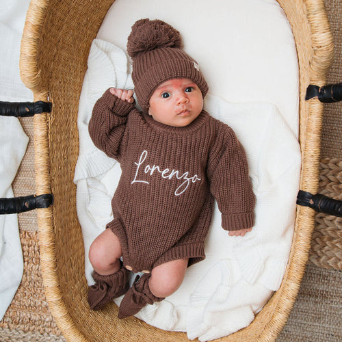 Personalised knitted romper and beanie set in dark brown, with 'lorenzo' print