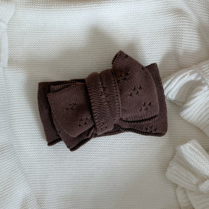 Brown bow headband in pointelle knit, double-layer bow with textured center