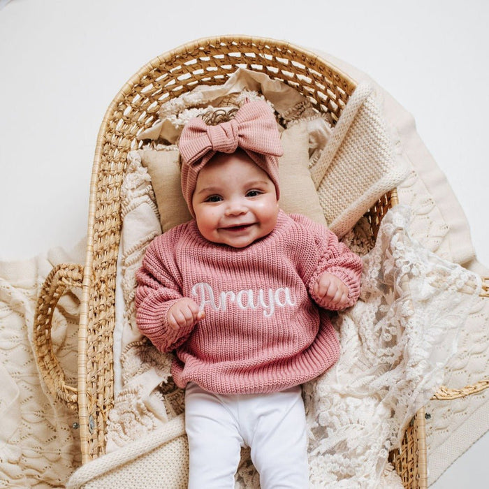 Dusty-pink chunky knit jumper with crew neck and name "Draya"
