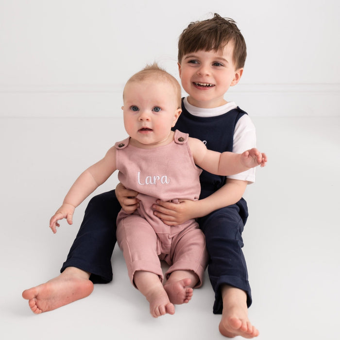 Dusty pink embroidered name dungarees with 'Lara' front, with navy behind