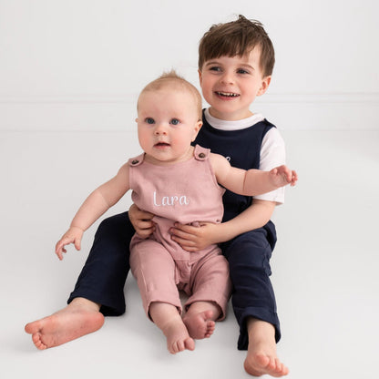 Dusty pink embroidered name dungarees with 'Lara' front, with navy behind