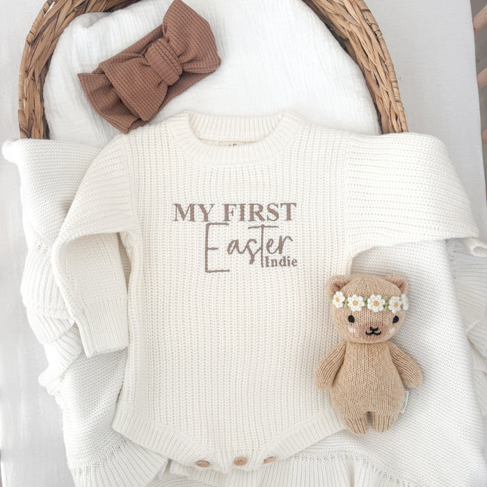 White knitted baby romper with 'My First Easter' and 'Indie' plus bunny applique