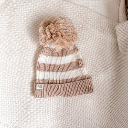 Knitted stripe beanie hat with pom-pom, beige and white stripes