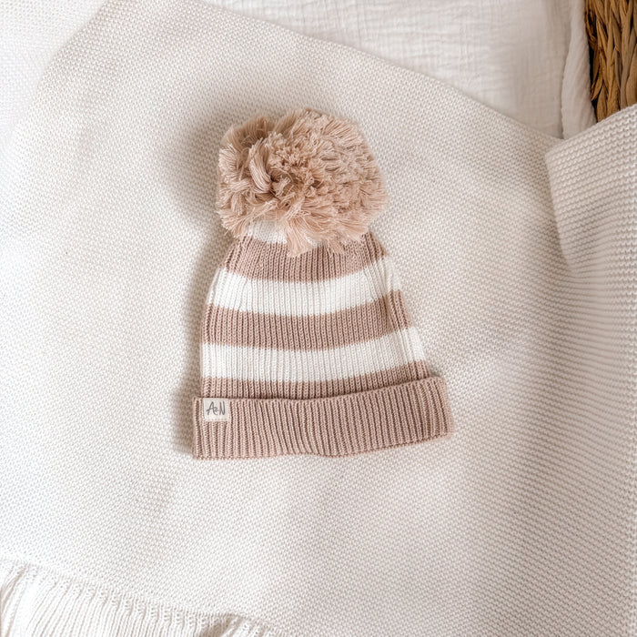 Striped knit beanie with pom-pom, ribbed cuff, beige and white stripes