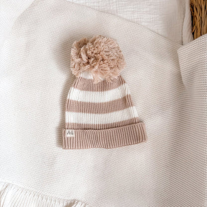 Striped knit beanie with pom-pom, ribbed cuff, beige and white stripes