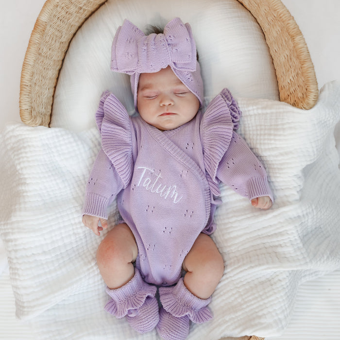 Lilac pointelle knitted baby romper with bow headband and ruffled leg cuffs