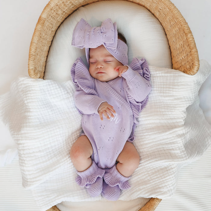 Lilac knitted baby romper with bow headband and ruffle-trim cuffs, newborn