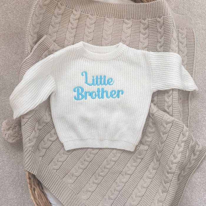 Personalised knitted jumper, white long-sleeve crewneck with light blue Little Brother