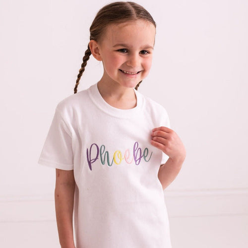 White T-shirt with pastel script embroidered logo across the chest