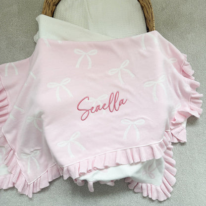 Personalised bow reversible blanket, pink with Seavella logo and white bow pattern