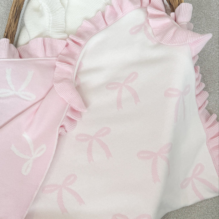 Personalised bow reversible blanket, reversible white side with pink bow pattern