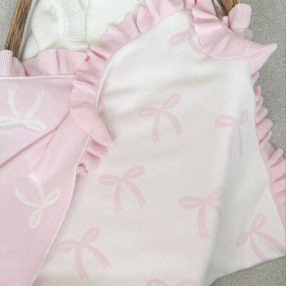 Personalised bow reversible blanket, reversible white side with pink bow pattern