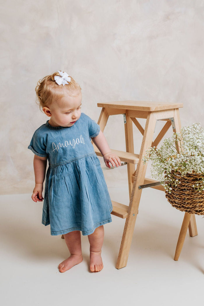 Personalised denim dress with embroidered 'Amayah', gathered waist and A-line skirt