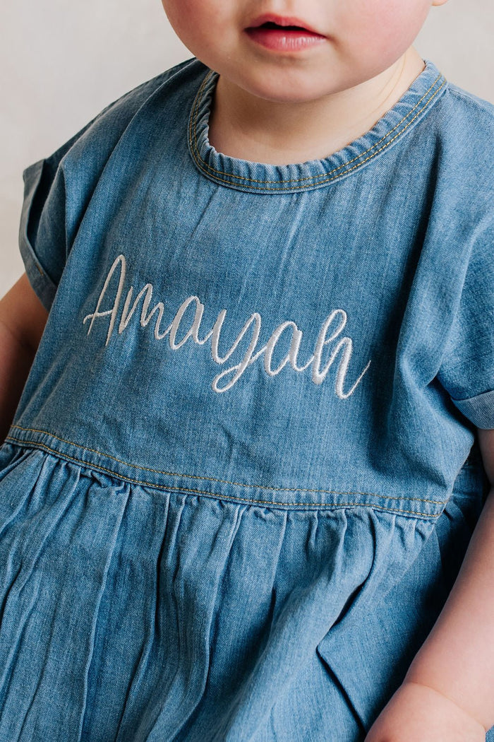 Personalised denim dress with embroidered 'Amayah' and gathered skirt
