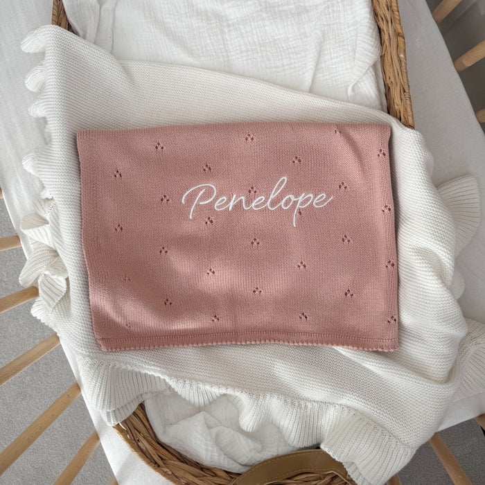 Pink pointelle baby knit blanket with "Penelope" and small star pattern