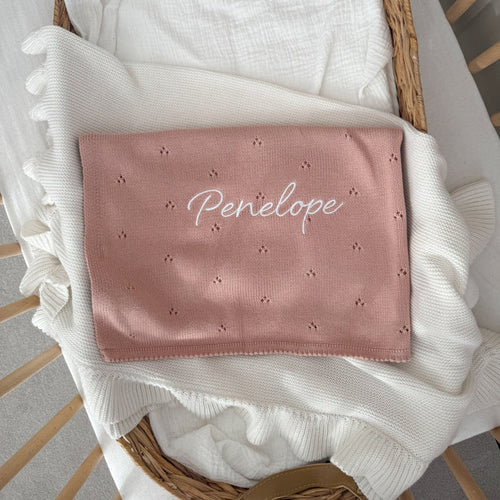 Pink pointelle baby knit blanket with "Penelope" and small star pattern