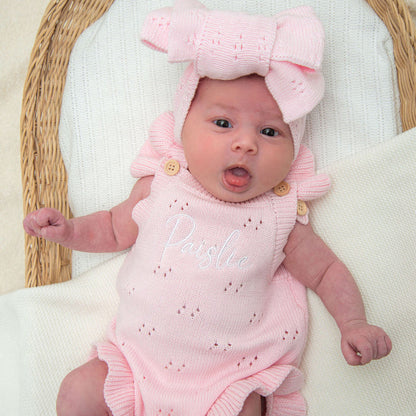 Pink pointelle romper with large bow headband and short ruffled legs