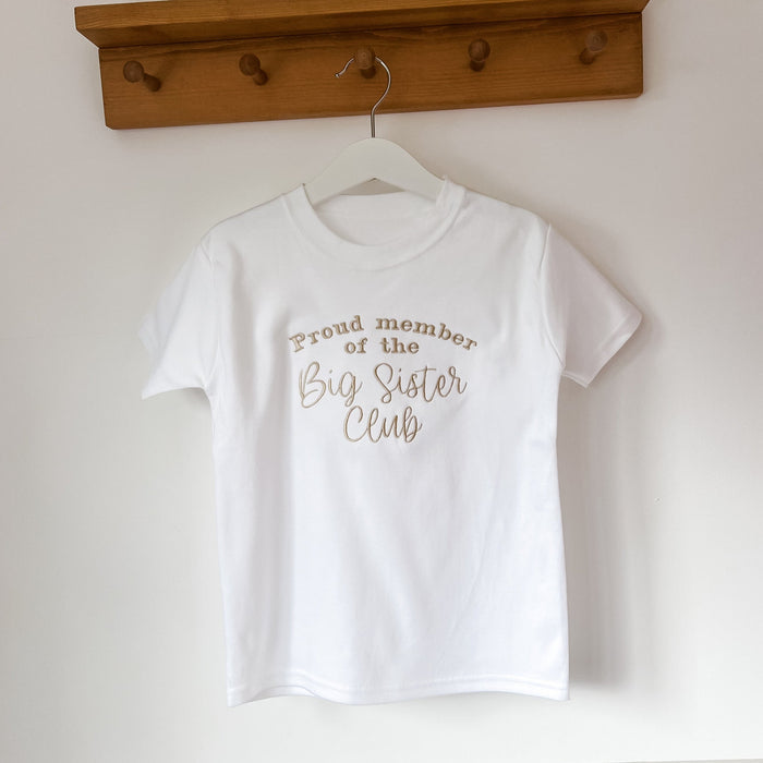 Children's white short-sleeve T-shirt with printed text: Proud member of the Big Sister Club