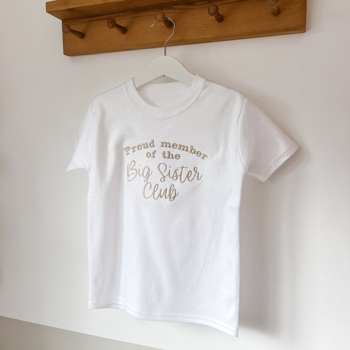 Children's white T-shirt with 'Big Sister Club' printed slogan at the center