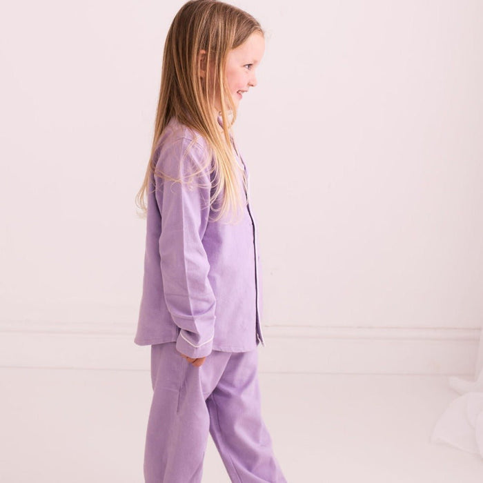 Purple pajama set, button-up shirt and pants in side view
