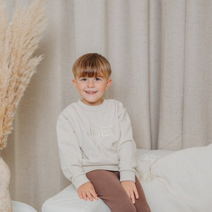 Light stone kids crewneck sweater, long sleeves, JOEY embroidered chest
