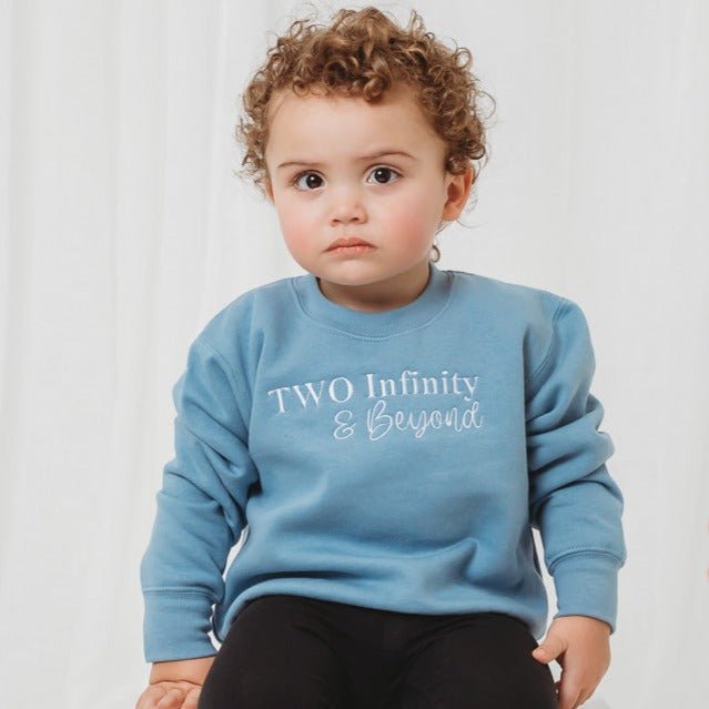 Light blue kids birthday sweater with 'Two Infinity & Beyond' front print