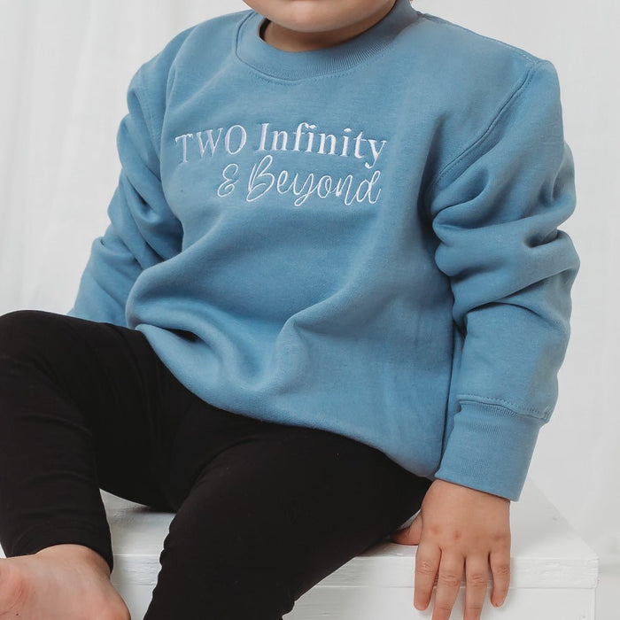 Light blue kids birthday sweater with 'Two Infinity & Beyond' front print, crew neck