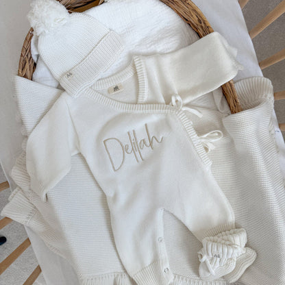 White long romper set with Delilah embroidery, long sleeves, and cuffed cuffs