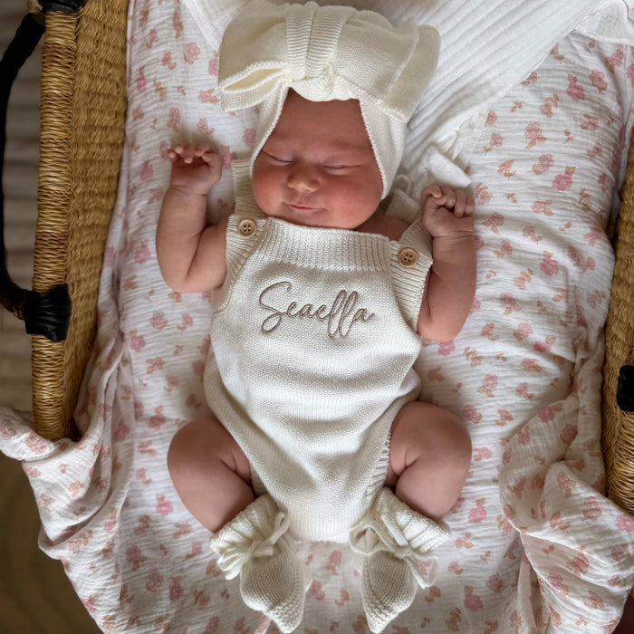 Personalised summer romper in white knit, with script name front and button shoulders
